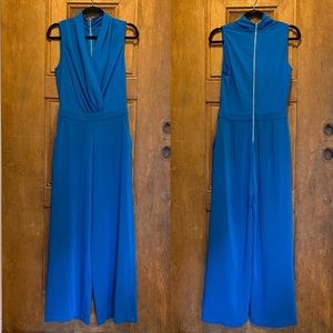 Bebe jumpsuit 8 blue zipper pockets